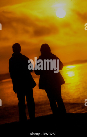 Sonnenuntergang über die Bucht von Budle, Northumberland Stockfoto