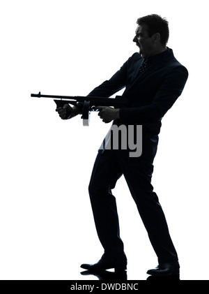 ein Mann hält Thompson Maschinengewehr in der Silhouette auf weißem Hintergrund