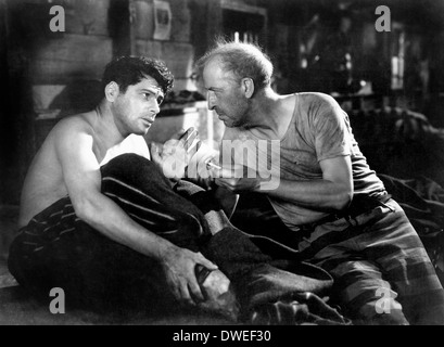 Paul Muni und Edward Ellis, am Set des Films "Ich bin ein Flüchtling aus einem Chain Gang" unter der Regie von Mervyn LeRoy, 1932 Stockfoto