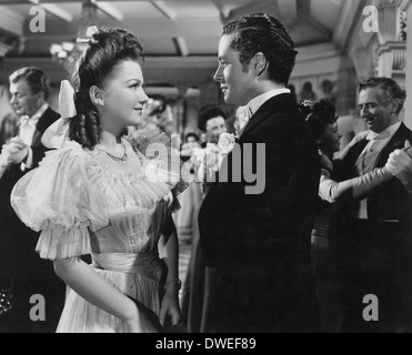 Joseph Cotten, Anne Baxter, Tim Holt und Ray Collins am Set des Films, "The Magnificent Ambersons" unter der Regie von Orson Welles, 1942 Stockfoto