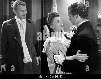 Joseph Cotten, Anne Baxter und Tim Holt, am Set des Films, "The Magnificent Ambersons" unter der Regie von Orson Welles, 1942 Stockfoto