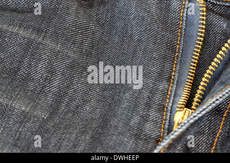 Textur des Blue Jeans und Reißverschluss im Makro. Stockfoto