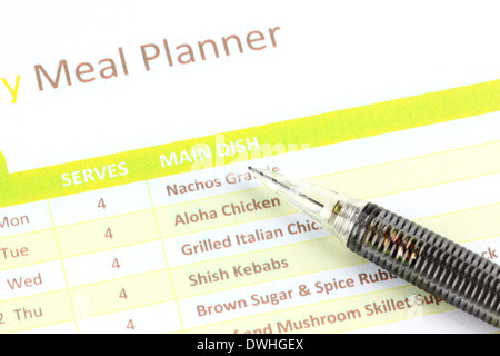 Closeup mechanischen Bleistift Punkt Meal Planner Graph. Stockfoto