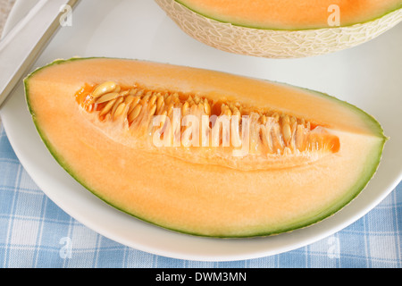 Eine beliebte Orange Melone Melone konkretisiert Stockfoto
