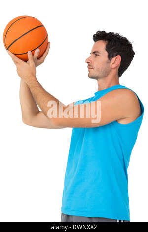 Ernsthafte Basketball-Spieler mit ball Stockfoto