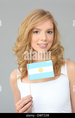 Frau eine argentinische Flagge winken Stockfoto