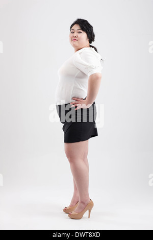 eine fette Frau posiert Stockfoto
