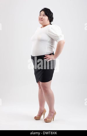 eine fette Frau posiert Stockfoto