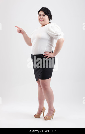 eine fette Frau posiert Stockfoto
