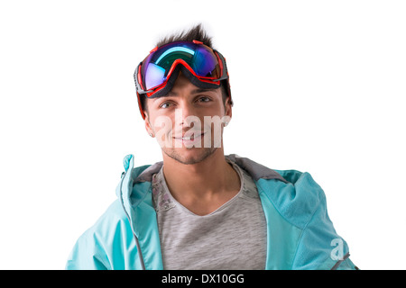 Freundliche attraktive junge männliche Skifahrer oder Snowboarder, die isoliert auf weißen Lächeln Stockfoto
