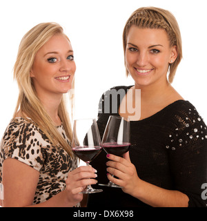 Toast - zwei Mädchen mit Glas Wein isoliert Stockfoto