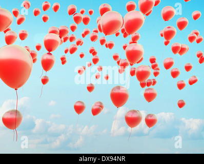 Hunderte von die kleine rote Luftballons fliegen Stockfoto