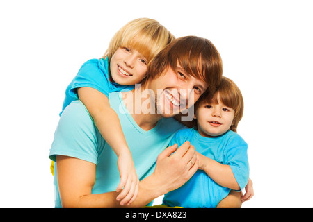 Vater mit Söhnen Stockfoto