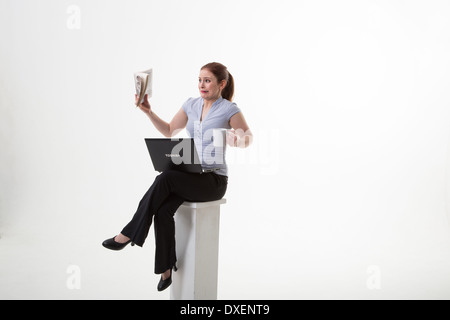 Multitasking-Frau Stockfoto