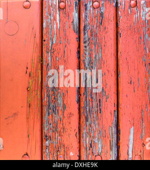 Die Holzverkleidung der alten gebrochenen Farbe Stockfoto