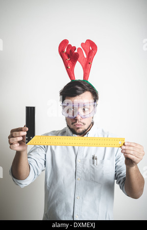 Bricolage Weihnachten stilvoll Jüngling auf weißem Hintergrund Stockfoto