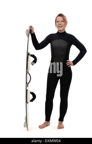 Frau in Neopren Anzug mit Kiteboard Stockfoto