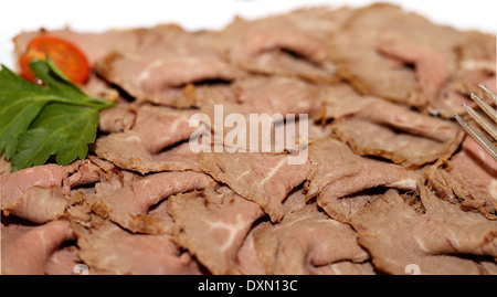 Rindfleisch fotografiert hautnah auf weißem Hintergrund Stockfoto