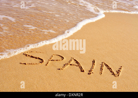 Spanien, geschrieben in den Sand des Strandes Stockfoto