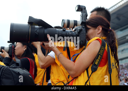 Hong Kong, China, Fotograf verwendet ein Teleobjektiv Stockfoto