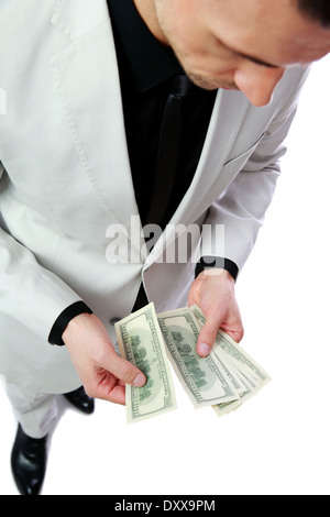 Zuversichtlich Geschäftsmann hält US-Dollar Stockfoto