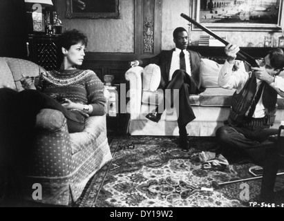 Curtis, Eddie Murphy und Dan Aykroyd, am Set des Films, "Trading Places", 1983 Stockfoto