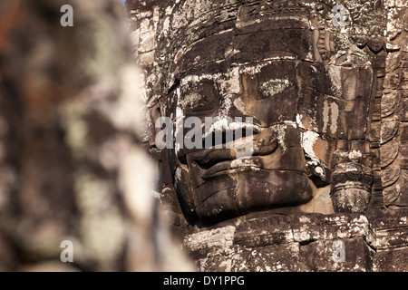 Skulptur von lächelndes Gesicht im Bayon-Tempel in Angkor in der Nähe von Siem Reap, Kambodscha Stockfoto