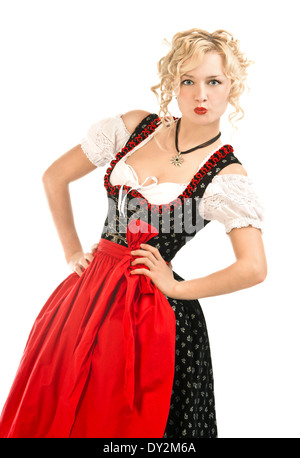 Deutsche Bayerin in typischer Kleidung Dirndl auf weißem Hintergrund Stockfoto