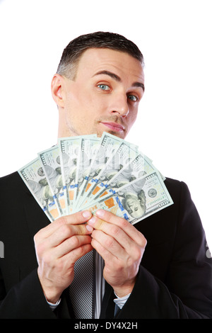 Gut aussehend Geschäftsmann hält US-Dollar auf einem weißen Hintergrund isoliert Stockfoto