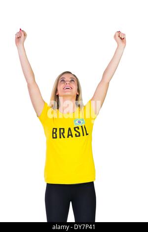 Aufgeregt Fußballfan in Brasil tshirt Stockfoto