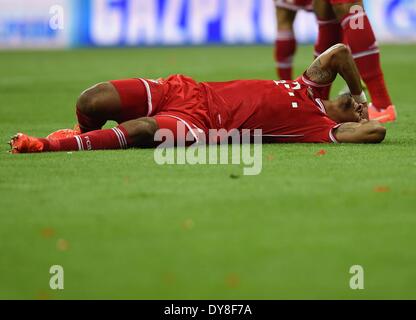 München, Allianz Arena. 9. April 2014. UEFA Champions League Viertelfinale, Rückspiel. FC Bayern München gegen Manchester United. Jerome Boateng (FC Bayern München) verletzt auf dem Feld Credit: Action Plus Sport/Alamy Live News Stockfoto