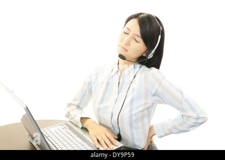 Frau Rückenschmerzen Stockfoto