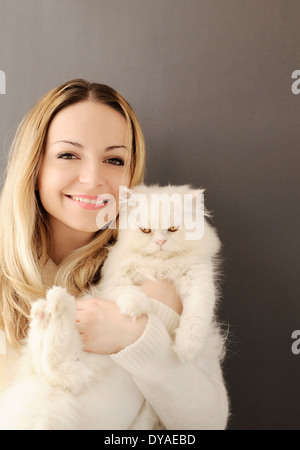 Mädchen und Katze Stockfoto