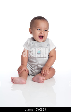 Sieben Monate alt, Hispanic Babyjungen, lachen. Stockfoto