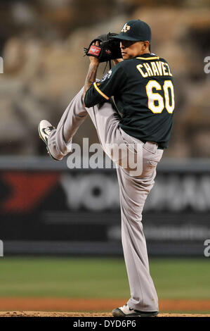 Anaheim, CA. 14. April 2014. Oakland Athletics ab Krug Jesse Chavez #60 Stellplätze während der Major League Baseball Spiel zwischen den Oakland Athletics und den Los Angeles Angels im Anaheim Stadium in Anaheim, California.Louis Lopez/CSM/Alamy Live News Stockfoto