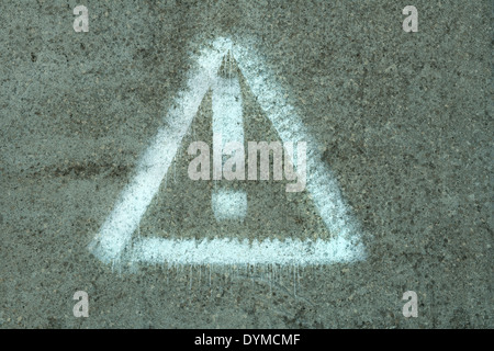 Symbol der Gefahr an der Wand Stockfoto