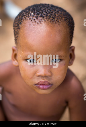 Bushman Baby Boy, Tsumkwe, Namibia Stockfoto