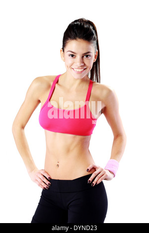 Porträt einer jungen lächelnd Sport Frau auf weißem Hintergrund Stockfoto