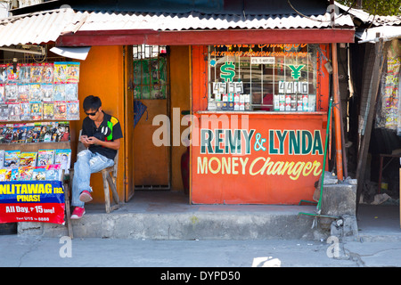 Geldwechsler in Angeles City, Luzon, Philippinen Stockfoto