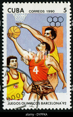 Kuba - CIRCA 1990: Eine Briefmarke gedruckt von Kuba zeigt Basketball. BARCELONA Olympiade 92 Serie, circa 1990 Stockfoto