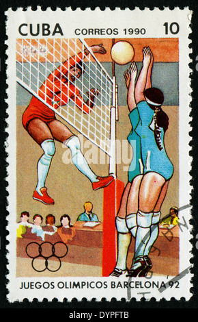 Kuba - CIRCA 1990 A Briefmarke gedruckt in Kuba zu Olympischen Spielen in Barcelona 1992 zeigt Volleyball, circa 1990 Stockfoto