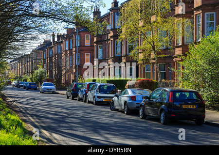 Clifford Street, Govan Glasgow zeigt eine Reihe von traditionellen roten Sandstein Mietskasernen, die häufig in Glasgow, Scotland, UK Stockfoto