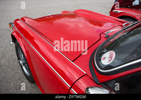 Eine vollständig restaurierte rote Triumph TR4a-Sportwagen Stockfoto