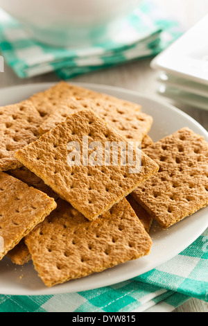 Gesunden Honig Graham Cracker auf einem Teller Stockfoto