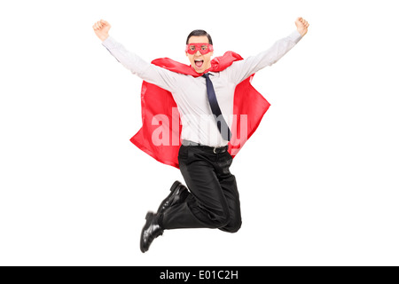 Männlichen Superhelden aus Glück springen Stockfoto