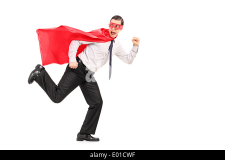 Mann in Superhelden-Kostüm auf der Flucht vor etwas Angst Stockfoto