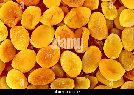 Die Textur der orange und gelbe getrocknete Aprikosen Stockfoto