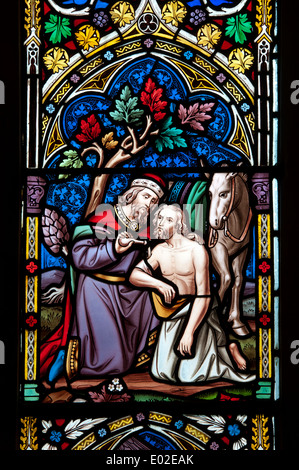 Samariter Glasmalerei, St.-Andreas Kirche, Alvington, Gloucestershire, England, UK Stockfoto