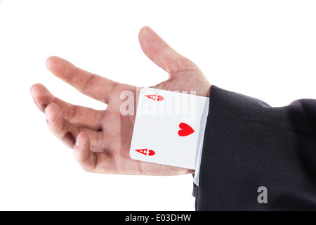 ein eleganter junger Geschäftsmann, Kartentricks mit Pokerkarten Stockfoto