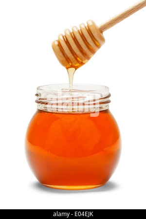 Glasglas Honig mit rühren Stock, Isolated on White Background. Stockfoto